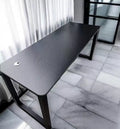 Bureau 120 x 60 x 75 cm noir en panneau de bois et métal avec passe-câbles style industriel